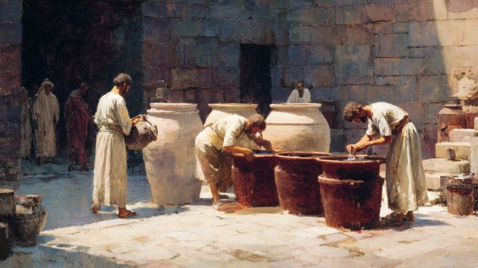 Water into Wine A painterly scene of an ancient Jewish wedding courtyard shows servants filling large stone water jars from clay pitchers, while others draw liquid from similar jars into smaller vessels. The jars stand in a row, and the servants work quietly without visible spectacle.